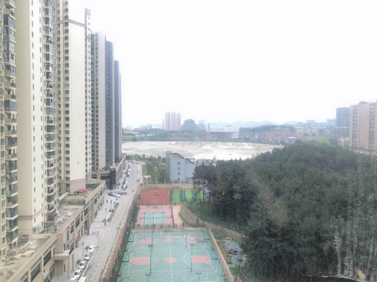 Iu Hotel Guiyang Olympic Sports Center China Resources Vientiane Экстерьер фото