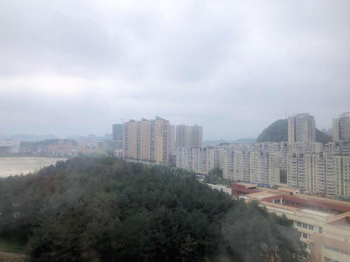 Iu Hotel Guiyang Olympic Sports Center China Resources Vientiane Экстерьер фото